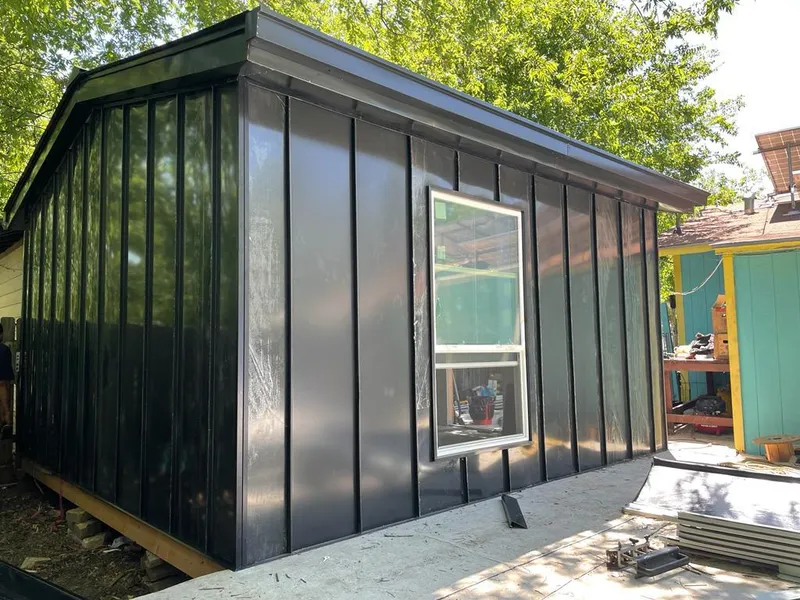 Black standing seam metal wall panels for Metal Roof Installation in Bluffton